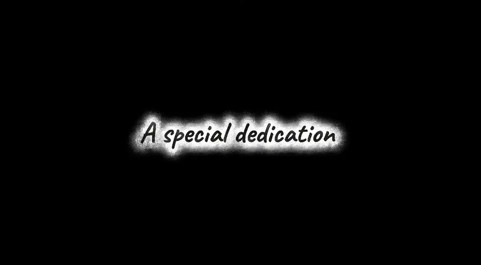 A black title card reading A special dedication.